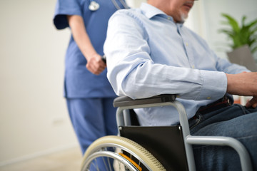 Nurse pushing a wheelchair