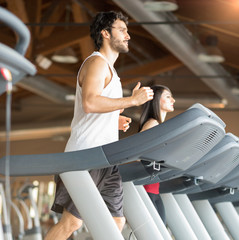 People running in a gym