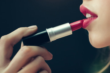 Girl with red lips and lipstick