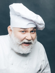 Smiling bearded cook