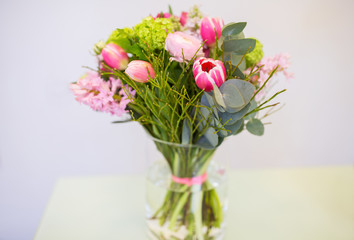 Fototapeta na wymiar close up of bunch in vase at flower shop