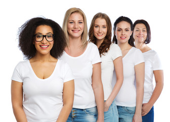 group of happy different women in white t-shirts