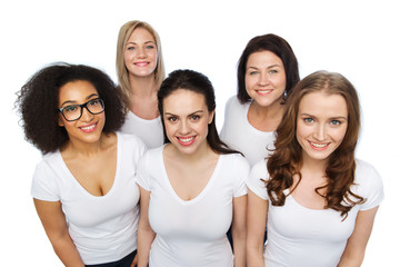 group of happy different women in white t-shirts