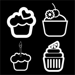 A set of four cakes, with heart, lemon and candle in outlines, over a black background, digital vector image