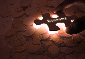 Economy Global Business with Puzzle Coins