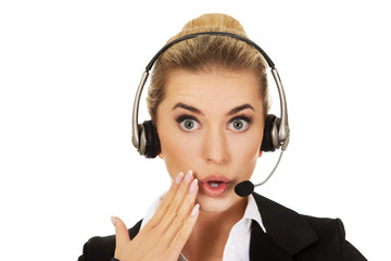 Young beautiful shocked helpline operator 