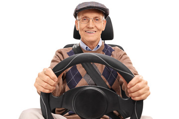 Senior driver holding a steering wheel