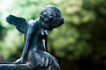 Angel with his head down