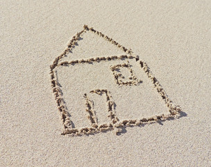 House, home drawing in the sand