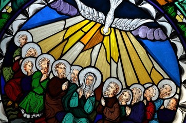 stained glass window depicting Pentecost - obrazy, fototapety, plakaty