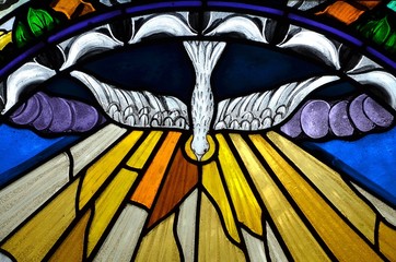 stained glass window depicting Pentecost - 110086872