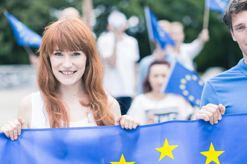 Woman with European Union flag - obrazy, fototapety, plakaty