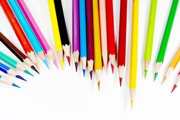 Multicolor colored pencils or crayons in white background.