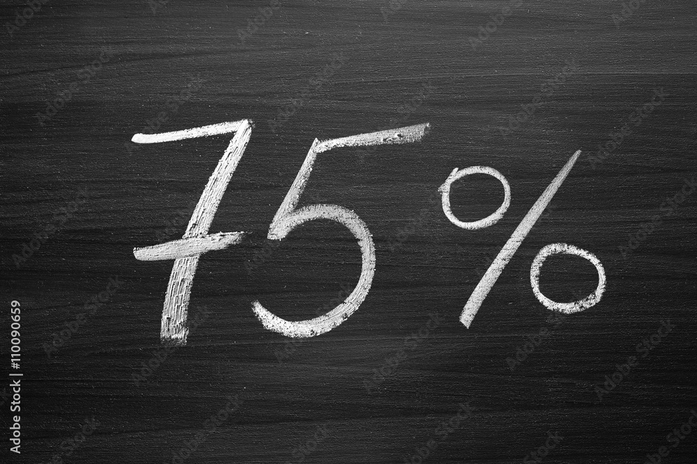 Wall mural 75 percent header written with a chalk on the blackboard