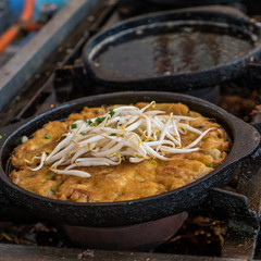 Oysters fried in egg batter.