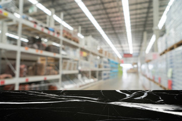 table top of marble stone on blur background of store - can use to display or montage product