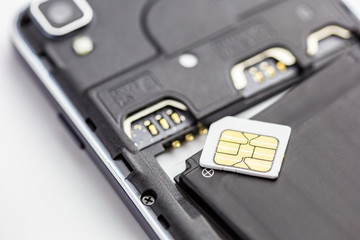 Sim card put on smart phone near sim card slot