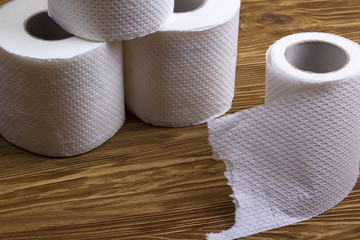 Toilet paper on wooden board
