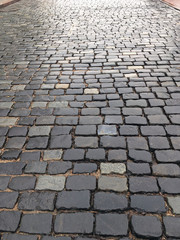 wet cobblestone street after rain