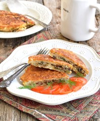 Matzo Brei a Jewish recipe of dampened matzo crackers fried with eggs, mushrooms, onions and dill.