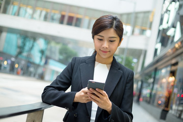 Fototapeta premium Young Business woman read on cellphone