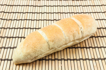 bread on wooden mat