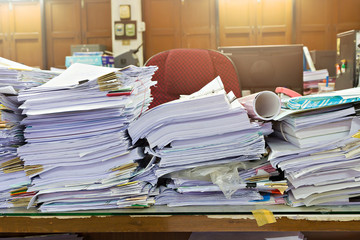 Close up of business documents stack on desk , report papers stack