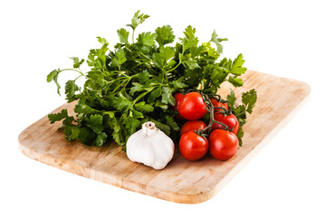 vegetables on a cutting board over white