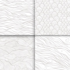 Neutral monochrome doodle seamless patterns set