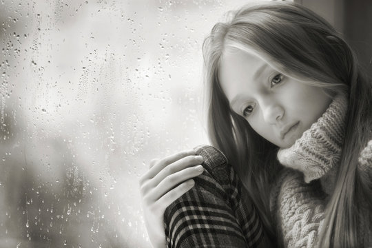  Rainy Day: sad Girl on the Window Black And White