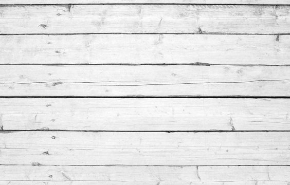 Old wooden wall with white paint, background photo