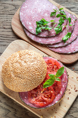 Sandwich with salami and tomatoes