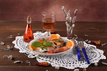 Salmon Steak and shrimp cooked on the plate