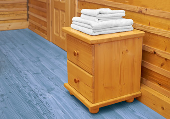 chest of drawers with a clean towel