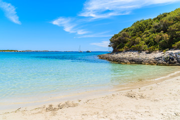 Fototapeta na wymiar Beautiful beach Petit Sperone with crystal clear azure sea water, Corsica island, France