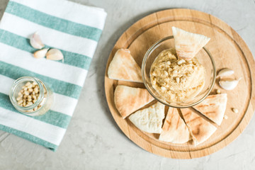 Healthy Homemade Creamy Hummus with Olive Oil and pitta