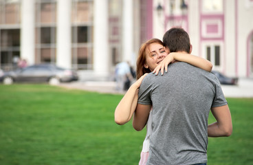 Fototapeta premium couple hugging in the park