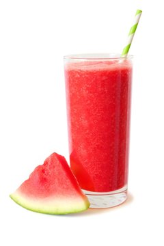 Glass of healthy watermelon juice isolated on a white background with melon slice