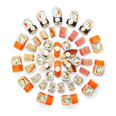 Set of sushi maki and rolls at black rustic wood. © Prostock-studio