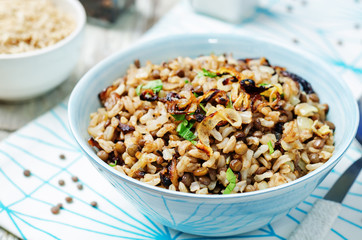Lentils and rice with Crispy Onions and Parsley. Mujadara