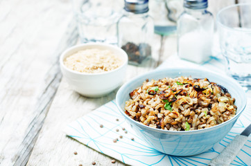 Lentils and rice with Crispy Onions and Parsley. Mujadara