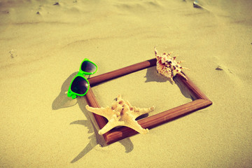 Frame on sand on the beach.
