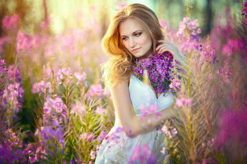 Fototapeta premium young beautiful girl in the field