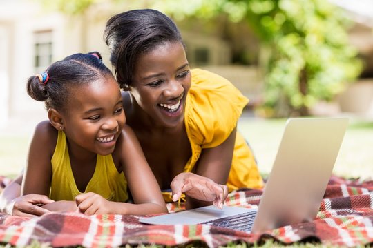 Happy Family Watching A Laptop