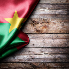 Flag of Burkina Faso on wooden boards