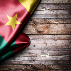Flag of Cameroon on wooden boards