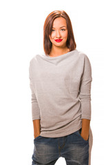 Fototapeta premium Beautiful happy young woman standing with hands in pockets.