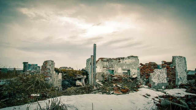 Cloudy sky over the destroyed building.Timelapse