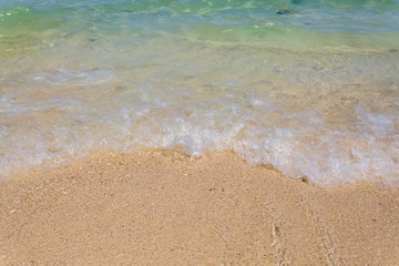 wave of the sea on sand beach