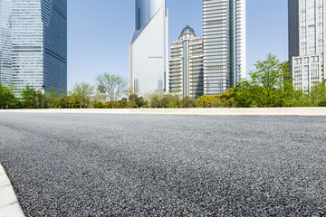 Fototapeta na wymiar Asphalt road in lujiazui Commercial financial center, Shanghai, China